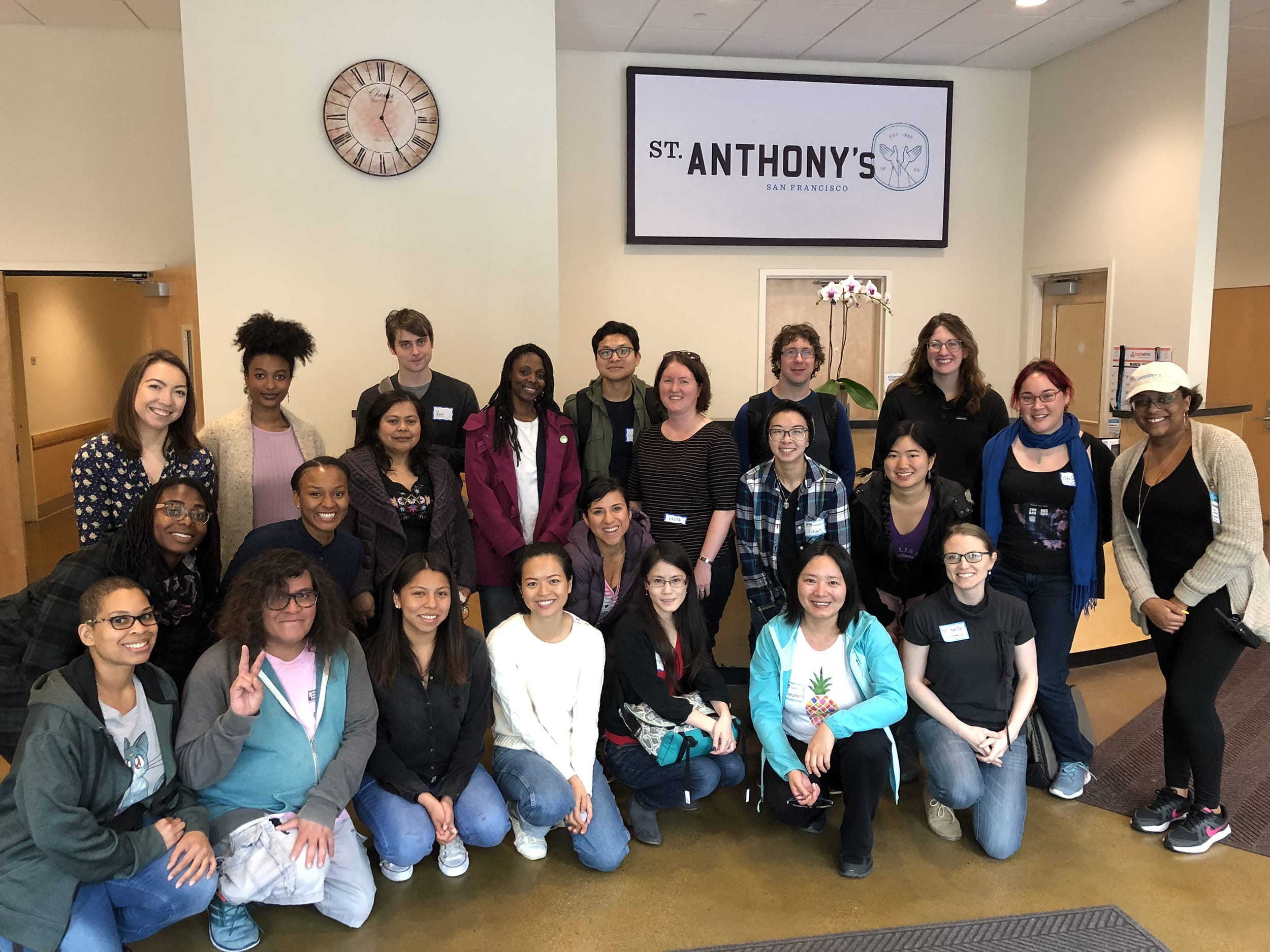 Volunteers and students taking a group picture